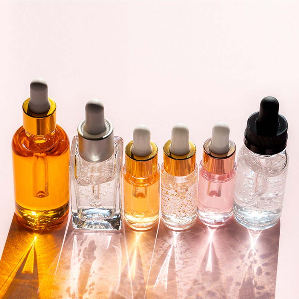 High-quality glass dropper bottle with plastic collar and custom logo for oils