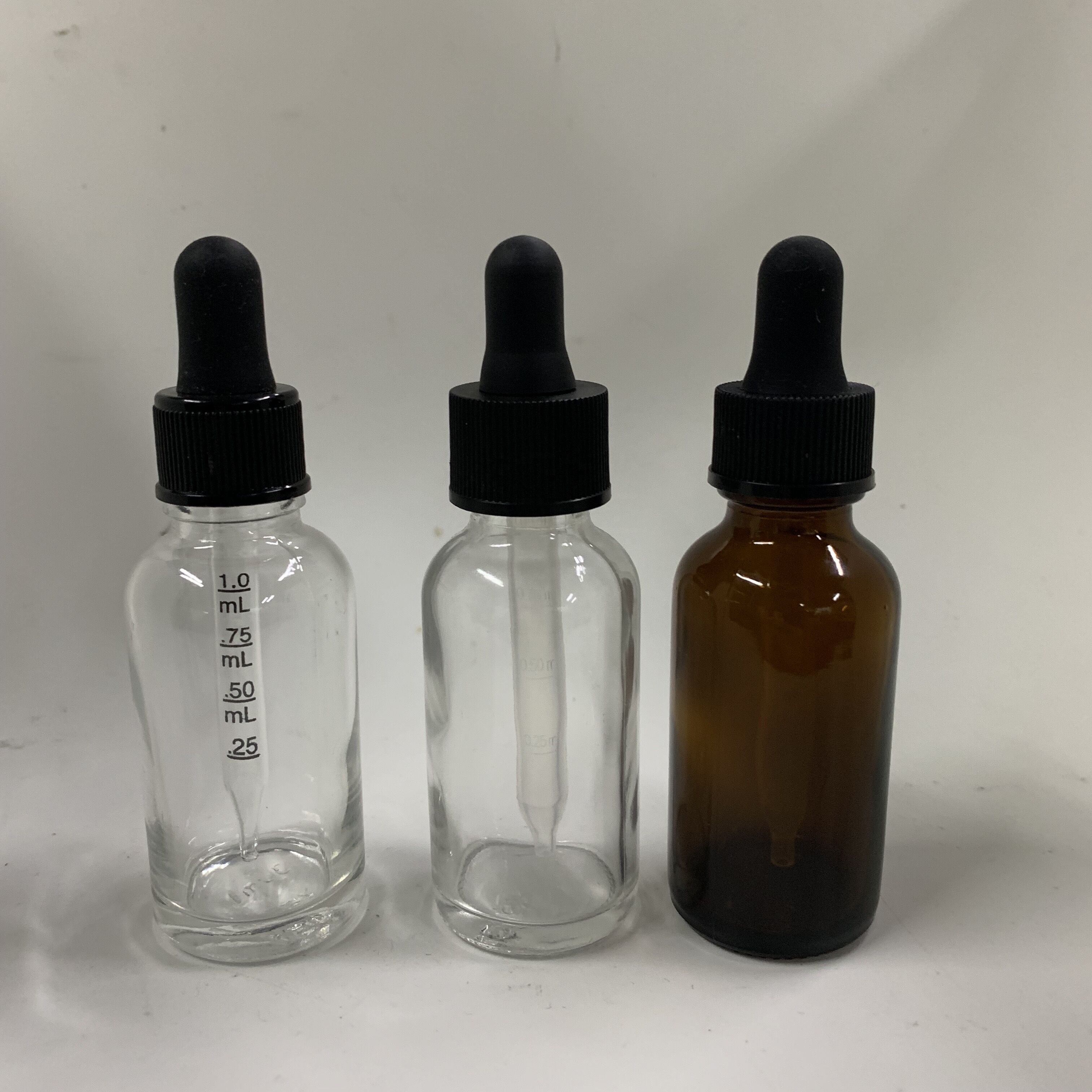 1oz clear Boston Round w/ Black CRC calibrated dropper