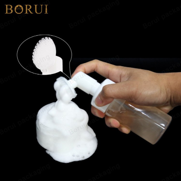 Low moq transparent round plastic bottle with brush pump cleaning facial brush foam bottle