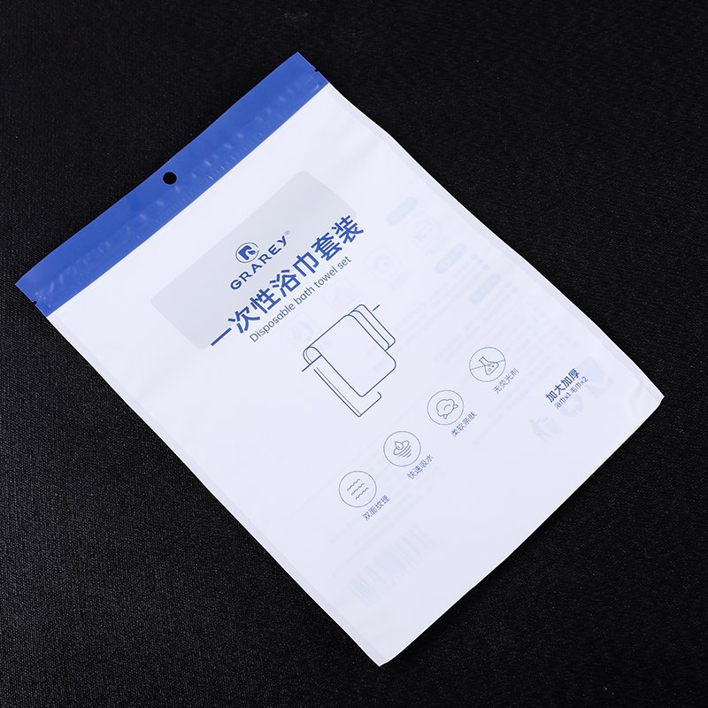 High Quality Custom Printed White Zipper Bags Disposable Portable Travel Bath Towel Plastic Packaging Pouches For Personal Care