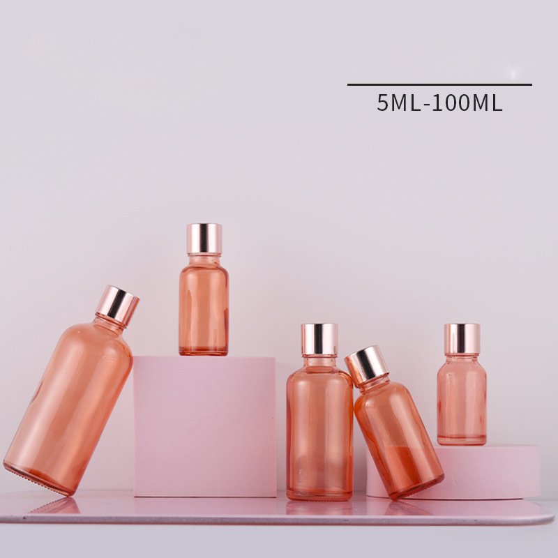 Rose Gold Round Shape Essence Serum Hair Oil Bottle Pink Glass Eye Pink Bottle