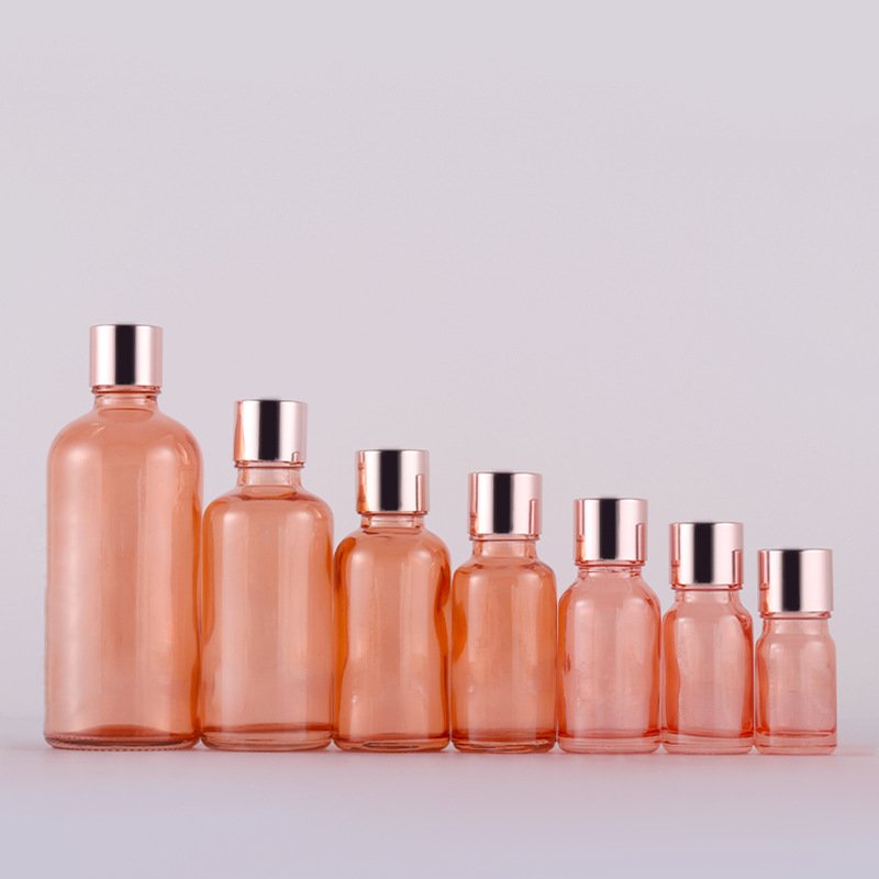 Rose Gold Round Shape Essence Serum Hair Oil Bottle Pink Glass Eye Pink Bottle