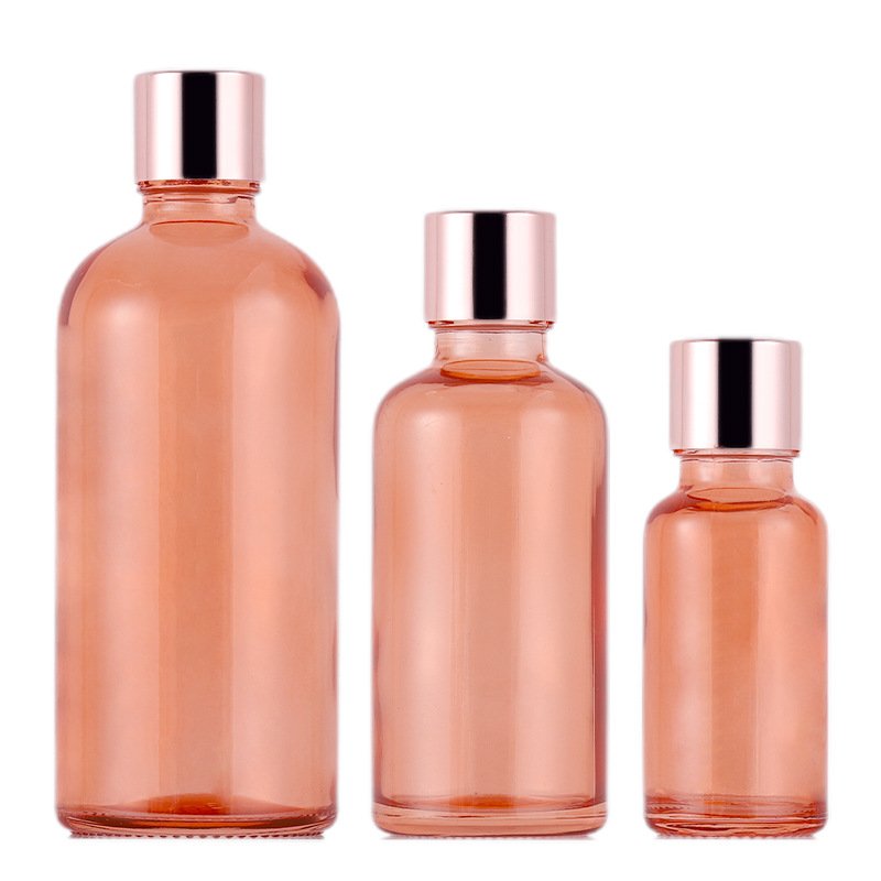 Rose Gold Round Shape Essence Serum Hair Oil Bottle Pink Glass Eye Pink Bottle