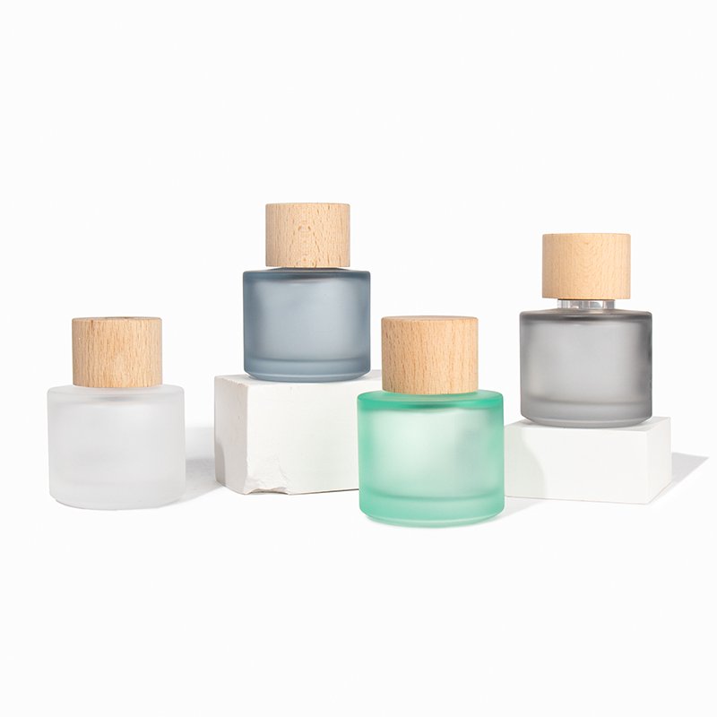 High Quality Cylindrical Colored Frosted Perfume Glass Bottle With Wooden Lid
