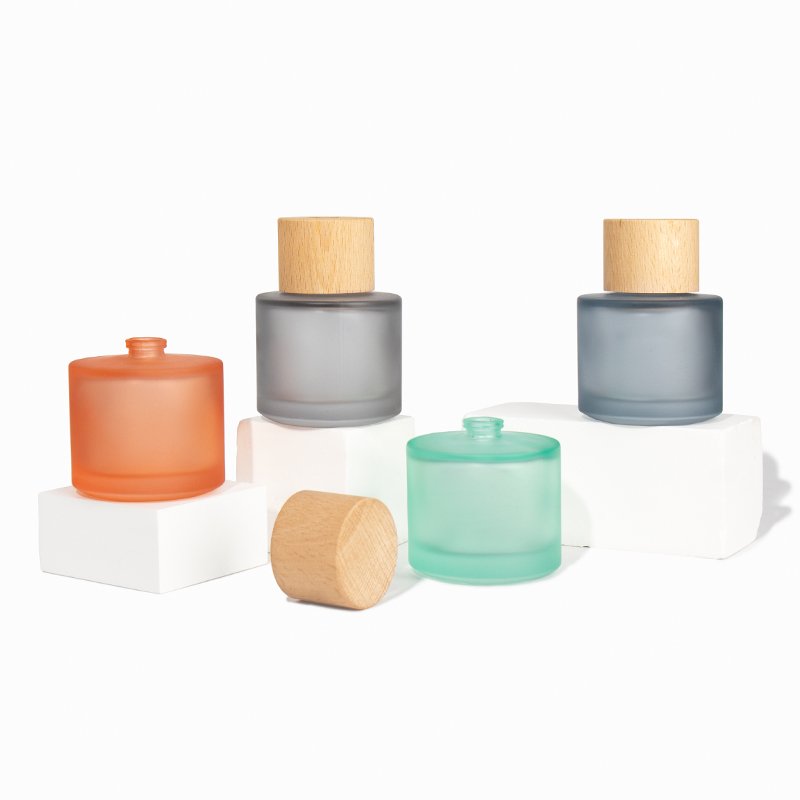 High Quality Cylindrical Colored Frosted Perfume Glass Bottle With Wooden Lid