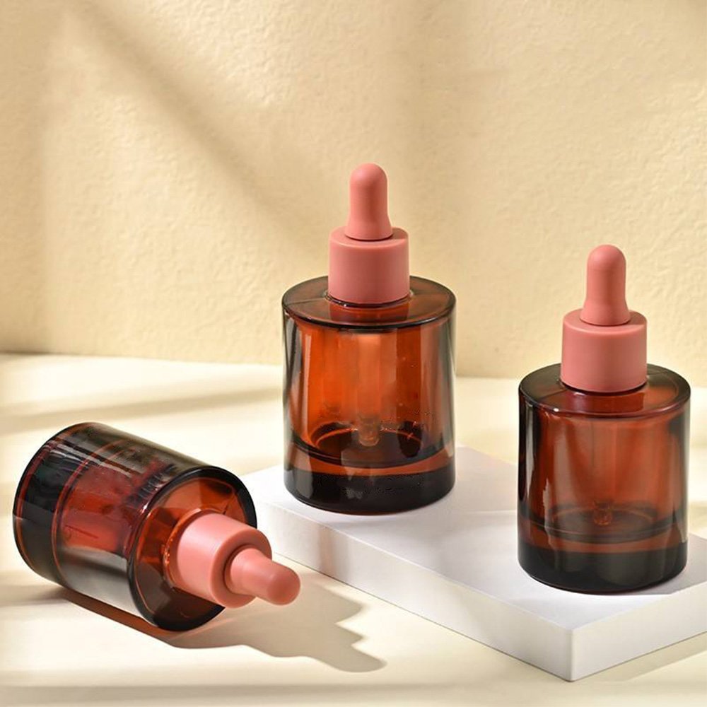 Personalized glass dropper bottle with aluminum collar for essential oil storage