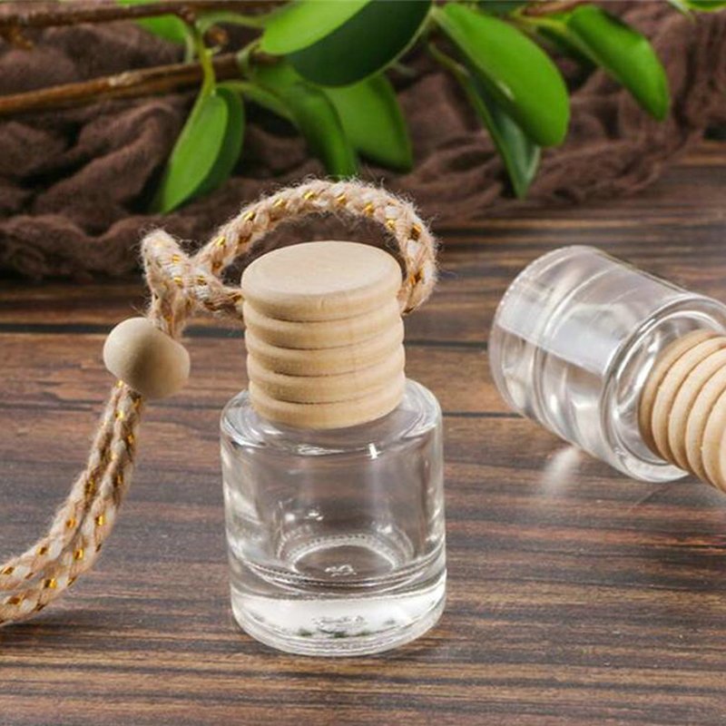 Factory wholesale Car Perfume Bottle Empty Reusable Wood Hanging Car Aroma Diffuser 8ml Car Perfume Bottle With Wooden Lids