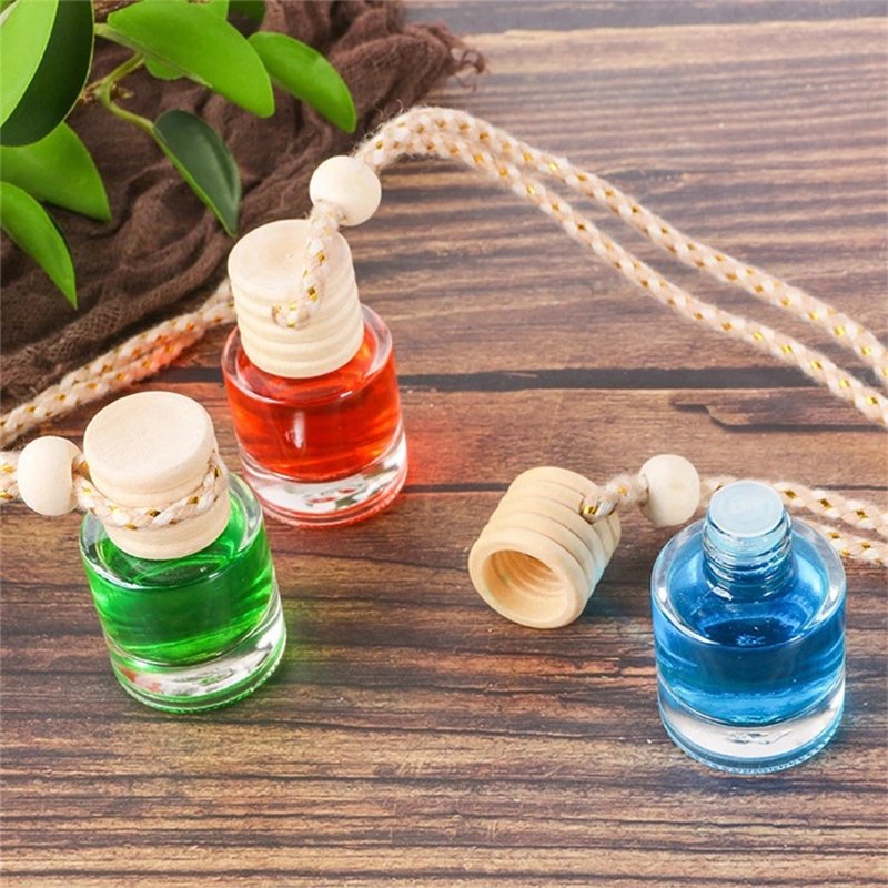 Factory wholesale Car Perfume Bottle Empty Reusable Wood Hanging Car Aroma Diffuser 8ml Car Perfume Bottle With Wooden Lids