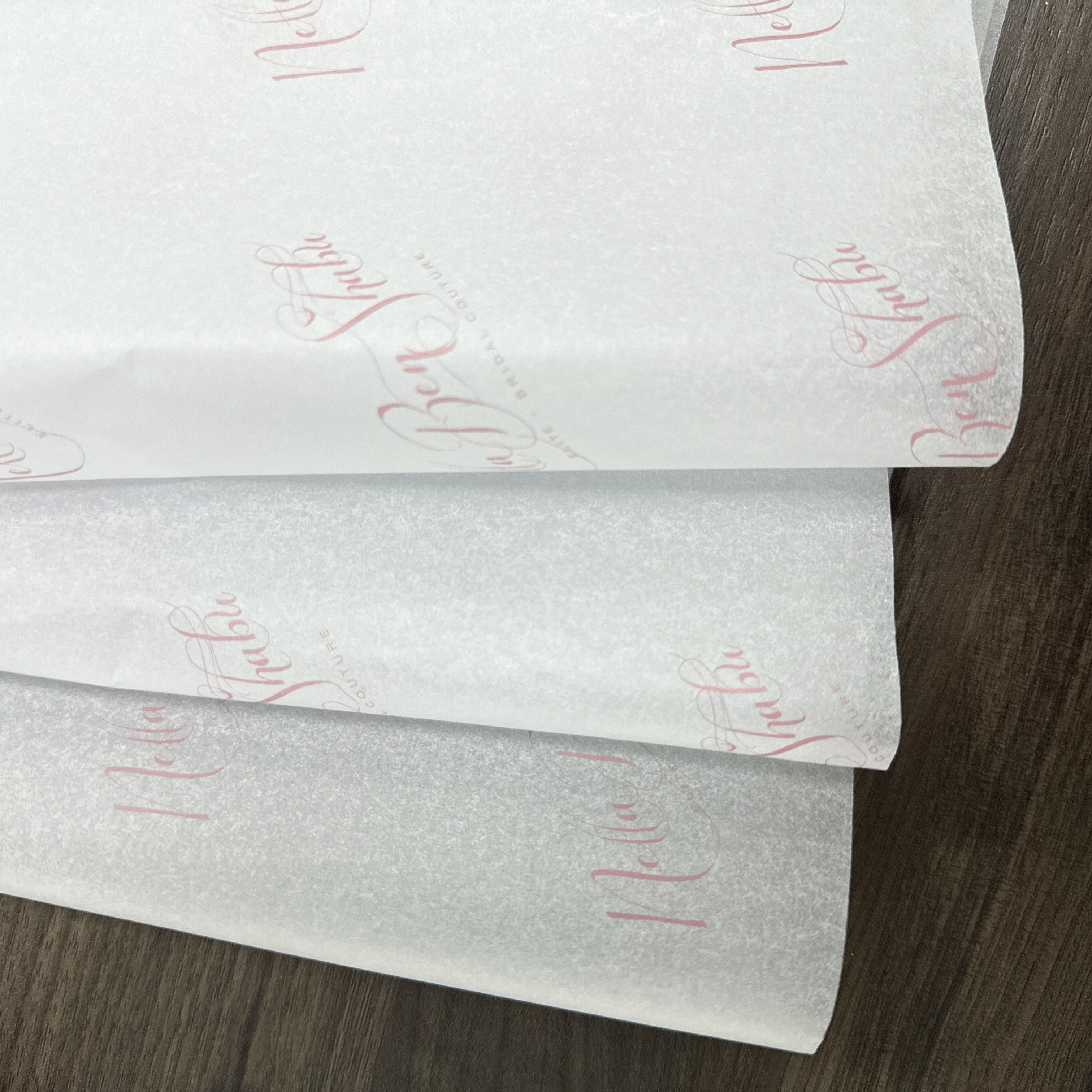 Refine Your Gift Presentation with Stylish Custom Logo Tissue Papers: Luxurious White and Bold Options for Clothing Wrapping