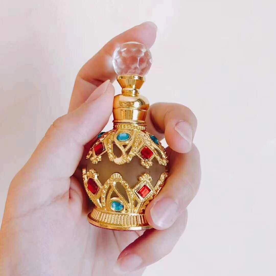Wholesale Selling Design 15ml Dubai Arabic Style Metal Golden Attar Essential Oil Perfume Glass Bottles With Glass Stick