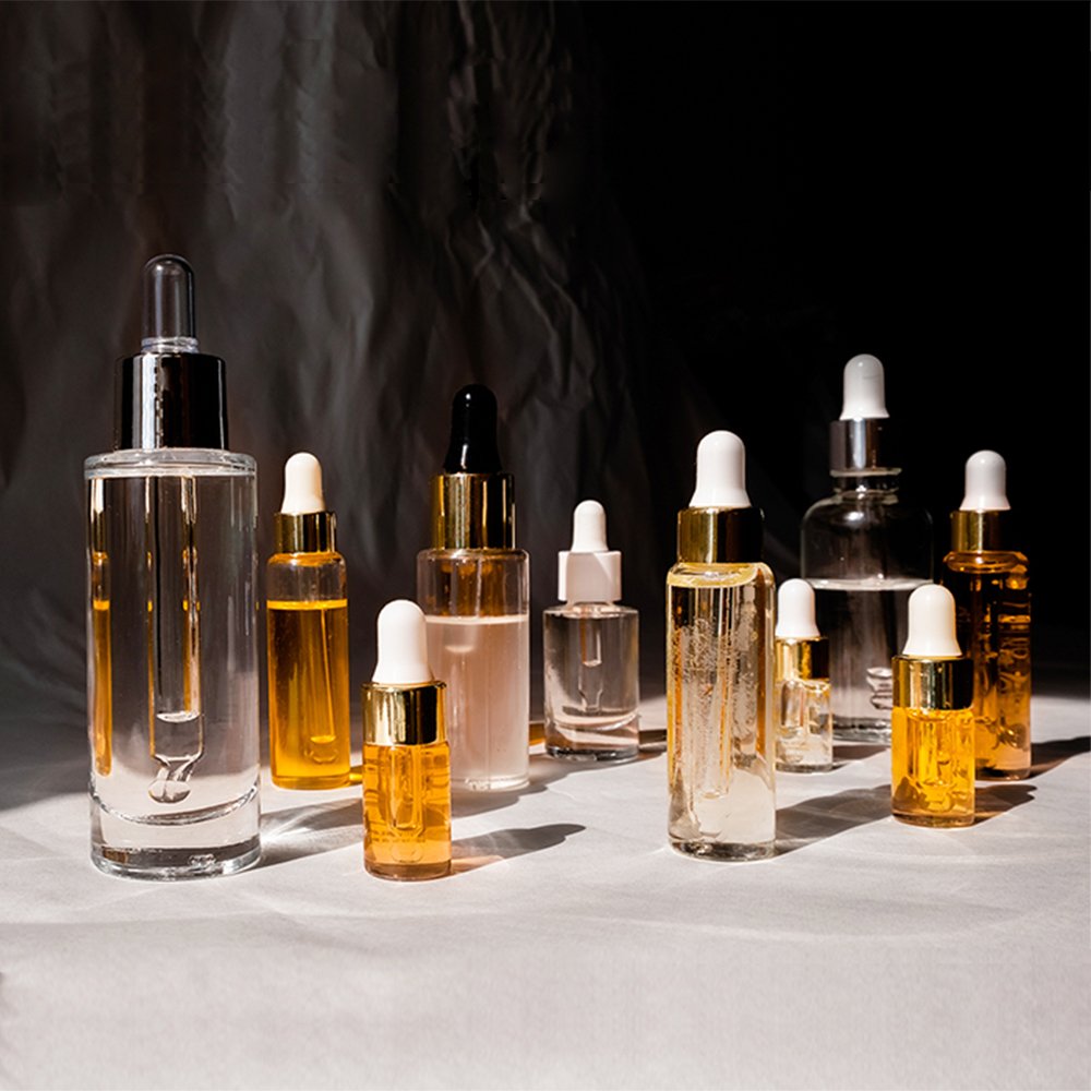 Square glass dropper bottle with aluminum collar and dropper cap for cosmetics