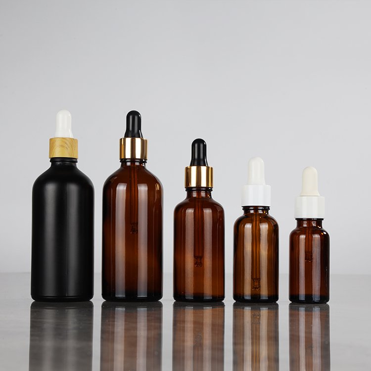 Factory direct sale essential oil packaging 5ml 10ml 15ml 20ml 30ml 50ml100ml clear blue amber glass dropper bottle