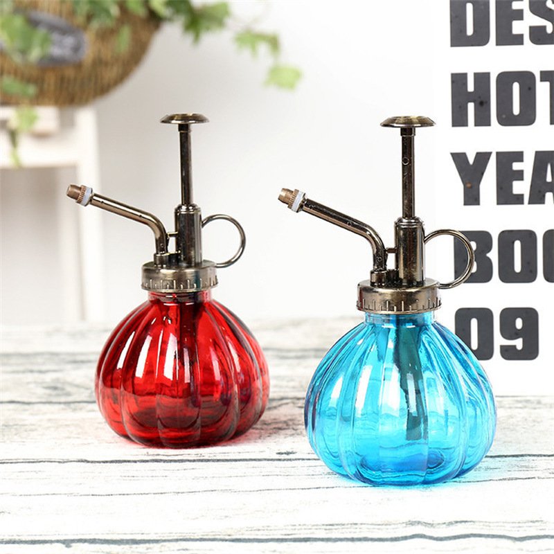Vintage Green Plant Decorative Glass Watering Bottle round with Plated Pump Sprayer and Screw Cap Screen Printed Surface