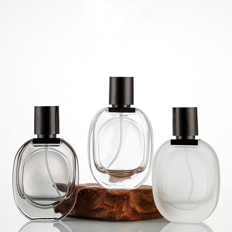 Luxury New Design Cylinder 30mL 100mL luxury glass perfume empty glass cosmetic container package 50 ml perfume bottle with box