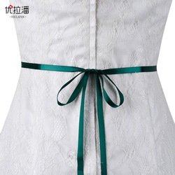 With a dark green ribbon