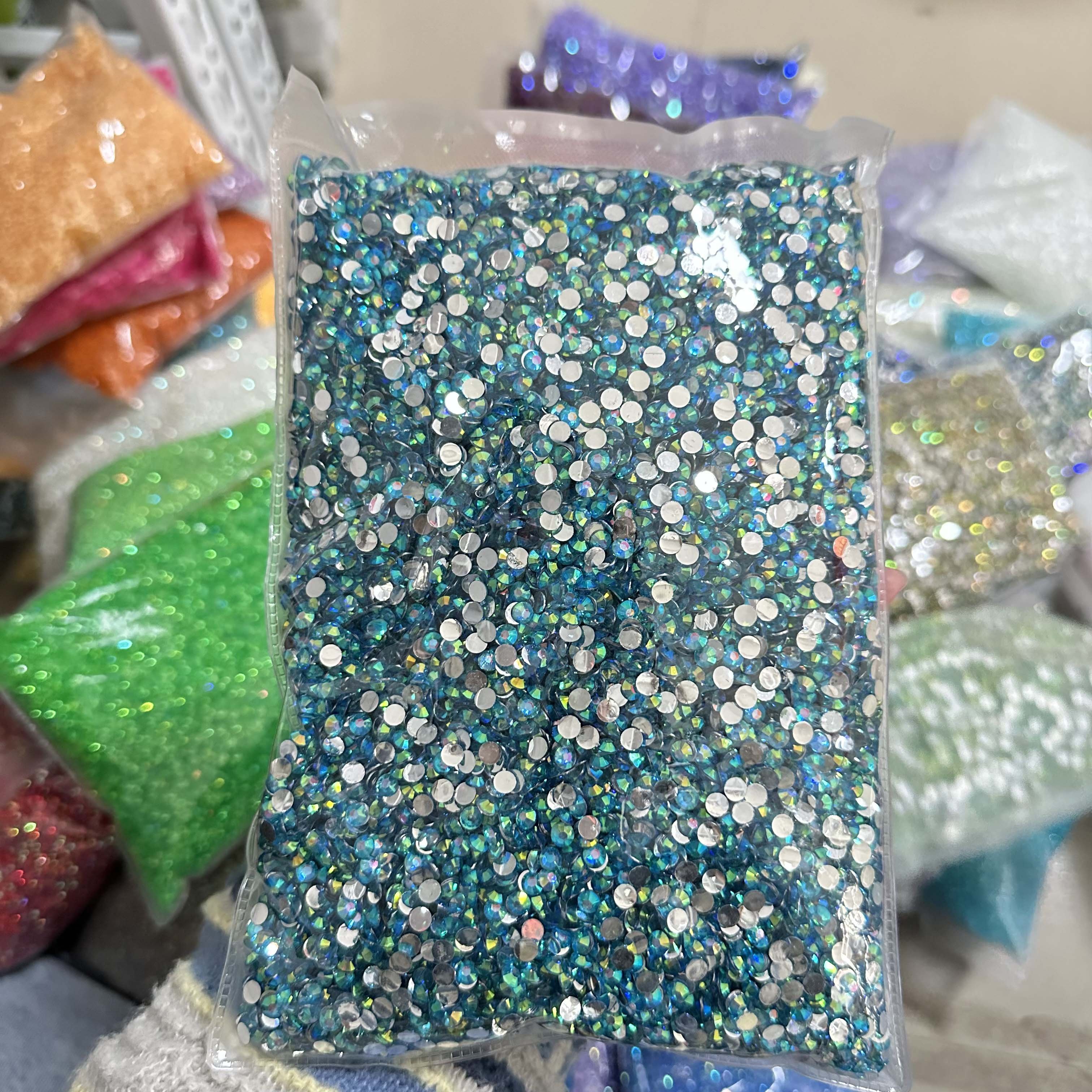 XULIN Over 100 Colors 2mm-6mm Customized Package Sliver Bottom AB Color Resin Flat Back Rhinestones Bulk
