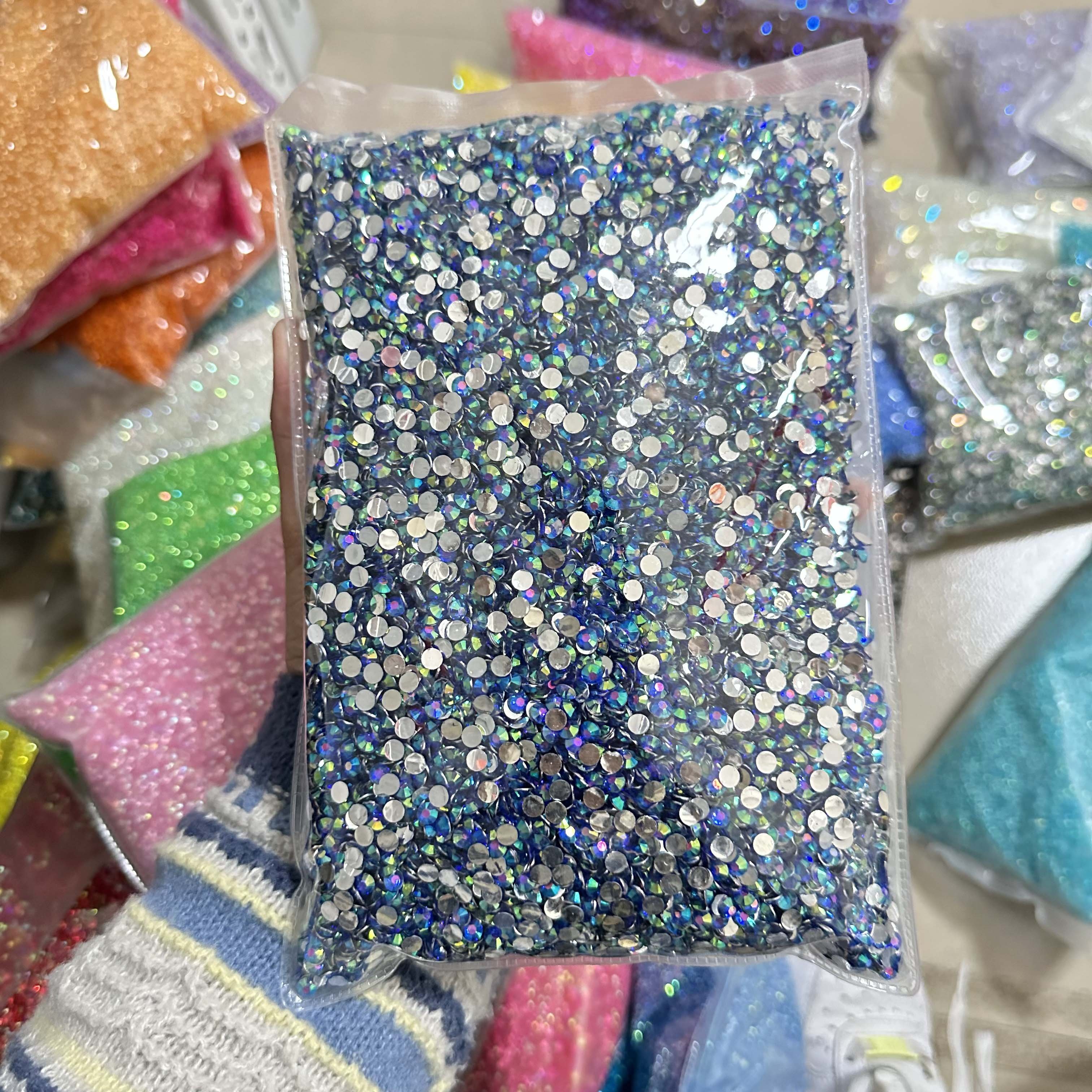XULIN Over 100 Colors 2mm-6mm Customized Package Sliver Bottom AB Color Resin Flat Back Rhinestones Bulk