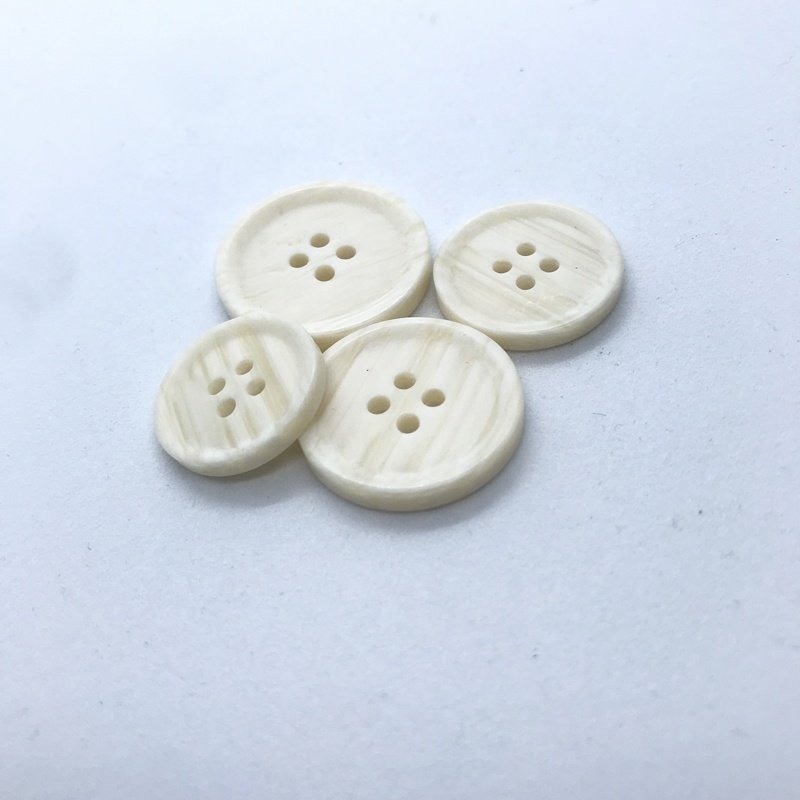 Resin button spot wholesale resin button high-grade suit button matte four-eye pattern buckle