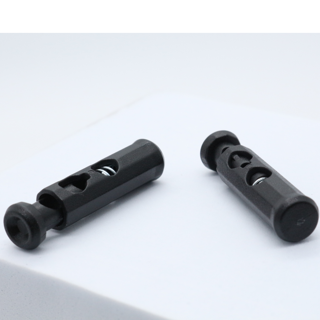 Hot Sale Spring Button Plastic Two-Hole Elastic Adjustment Clothing Fastener Rope Buckle For Clothing Accessories