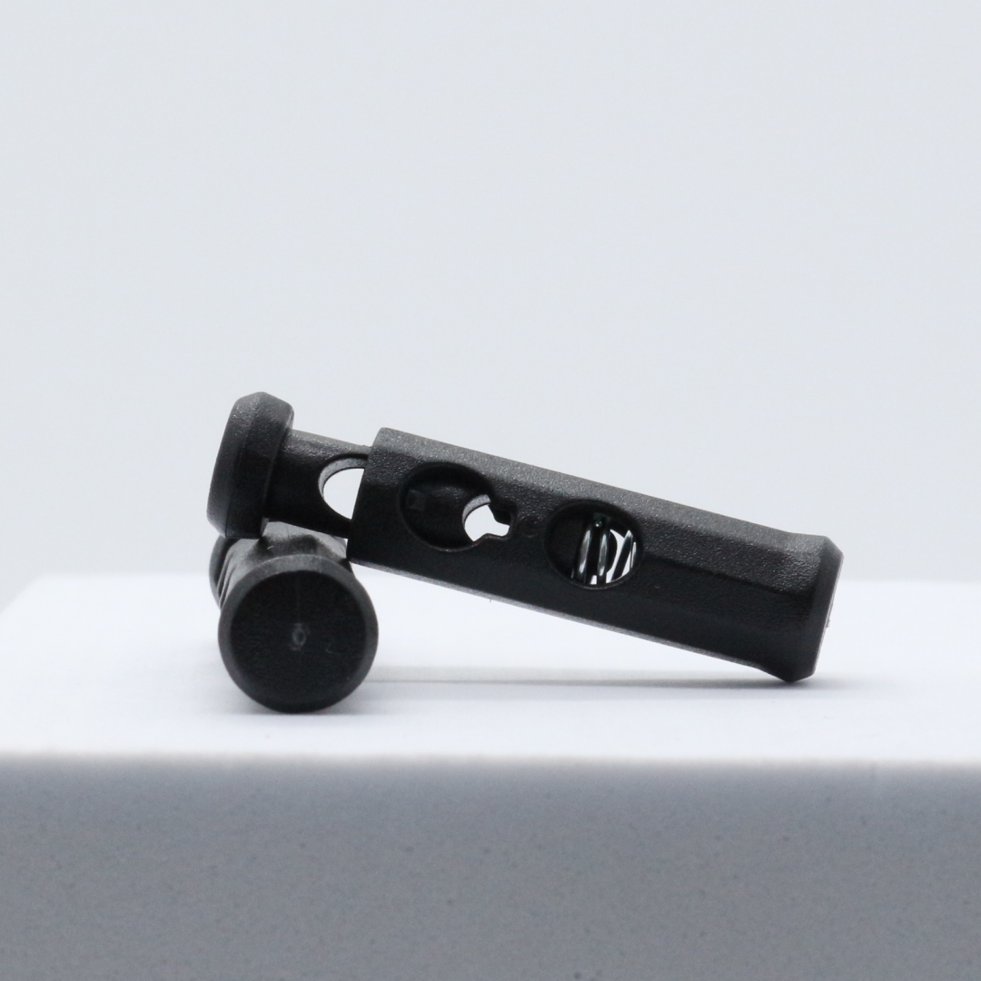 Hot Sale Spring Button Plastic Two-Hole Elastic Adjustment Clothing Fastener Rope Buckle For Clothing Accessories