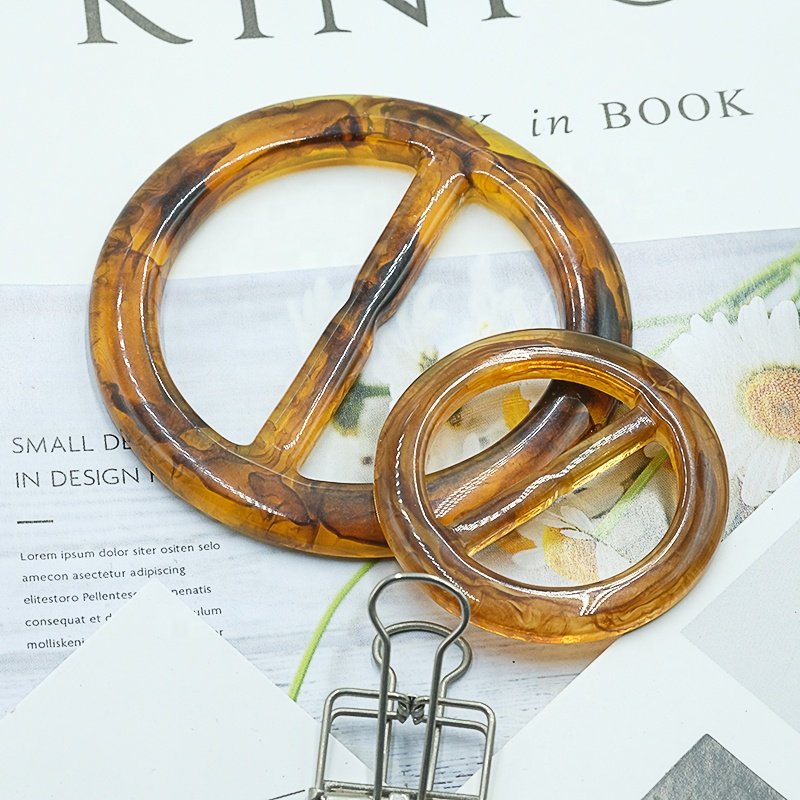 Hot selling custom buckles plastic resin dark coffee women coats belt buckles round waist buckles for clothing