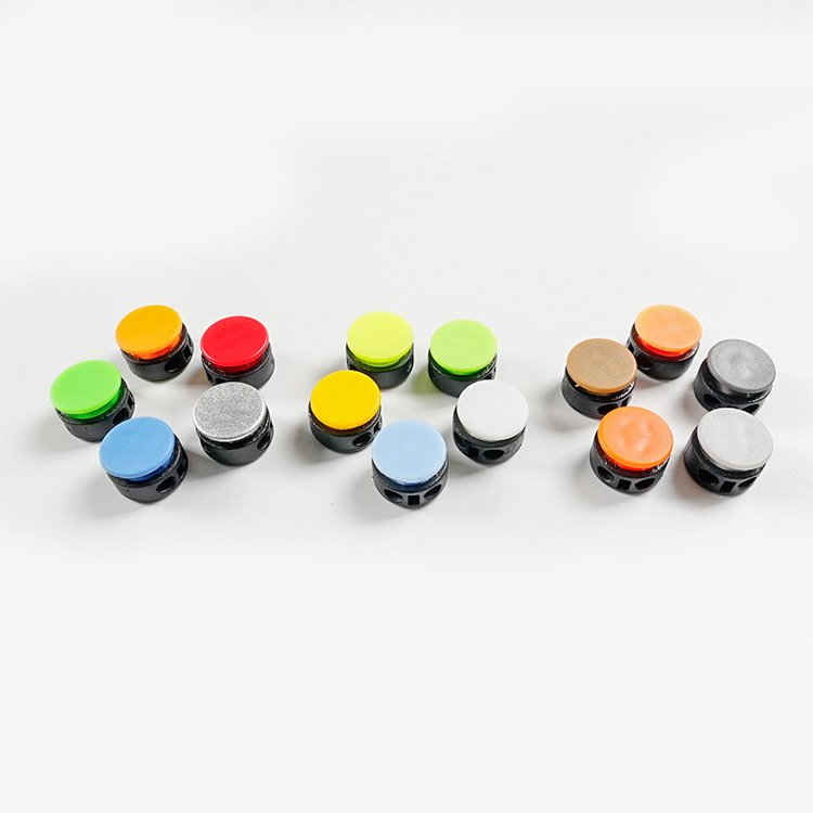 Cheap Ecofriendly Plastic Double Holes Colorful Cord Lock Toggle Stopper Spring Buckle Adjuster