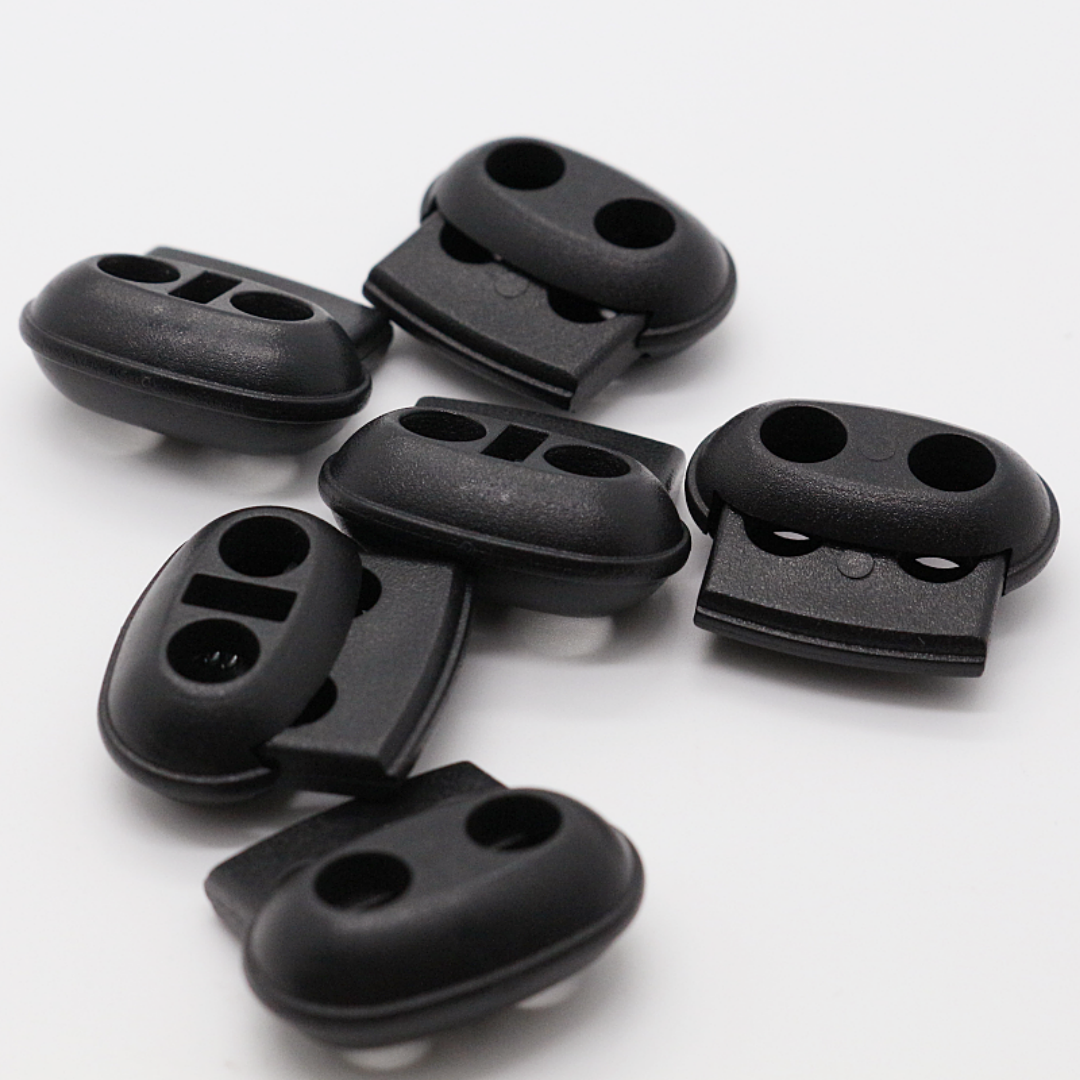 Wholesale High Quality Double Hole Plastic Spring Buckle Elastic Cord Lock For Hats Bedding Party Tent Raincoats