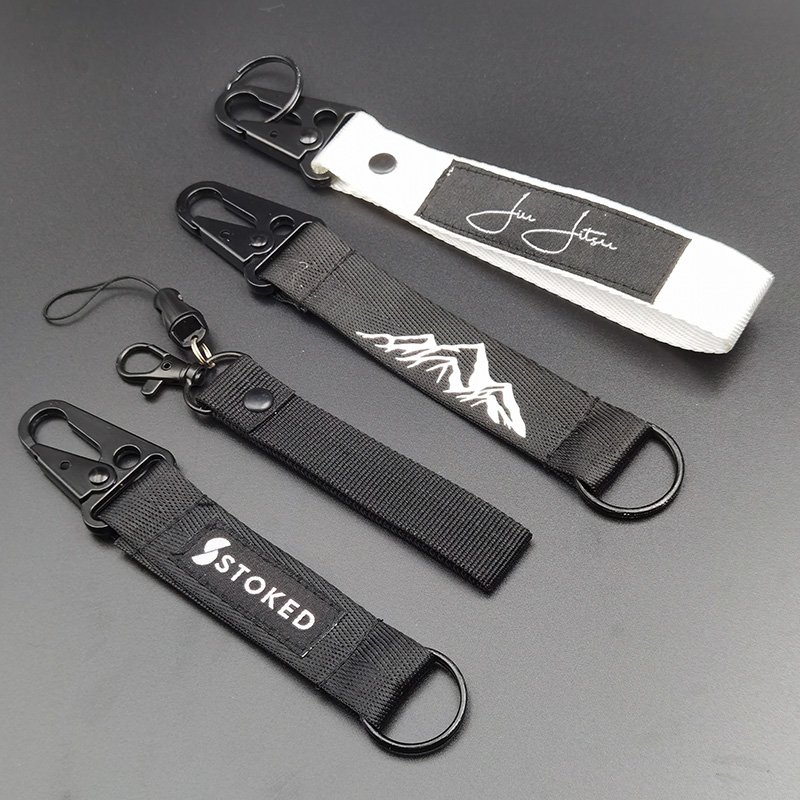 Custom black color nylon ribbon hard material one side rubber patch sewing logo outdoor strap wrist keychain short lanyard