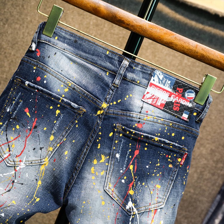 Hot Sale New Men Leisure Biker Jeans Wild Embroidery Printing Badge Trousers Spray Paint Hole Slim Fit Pants