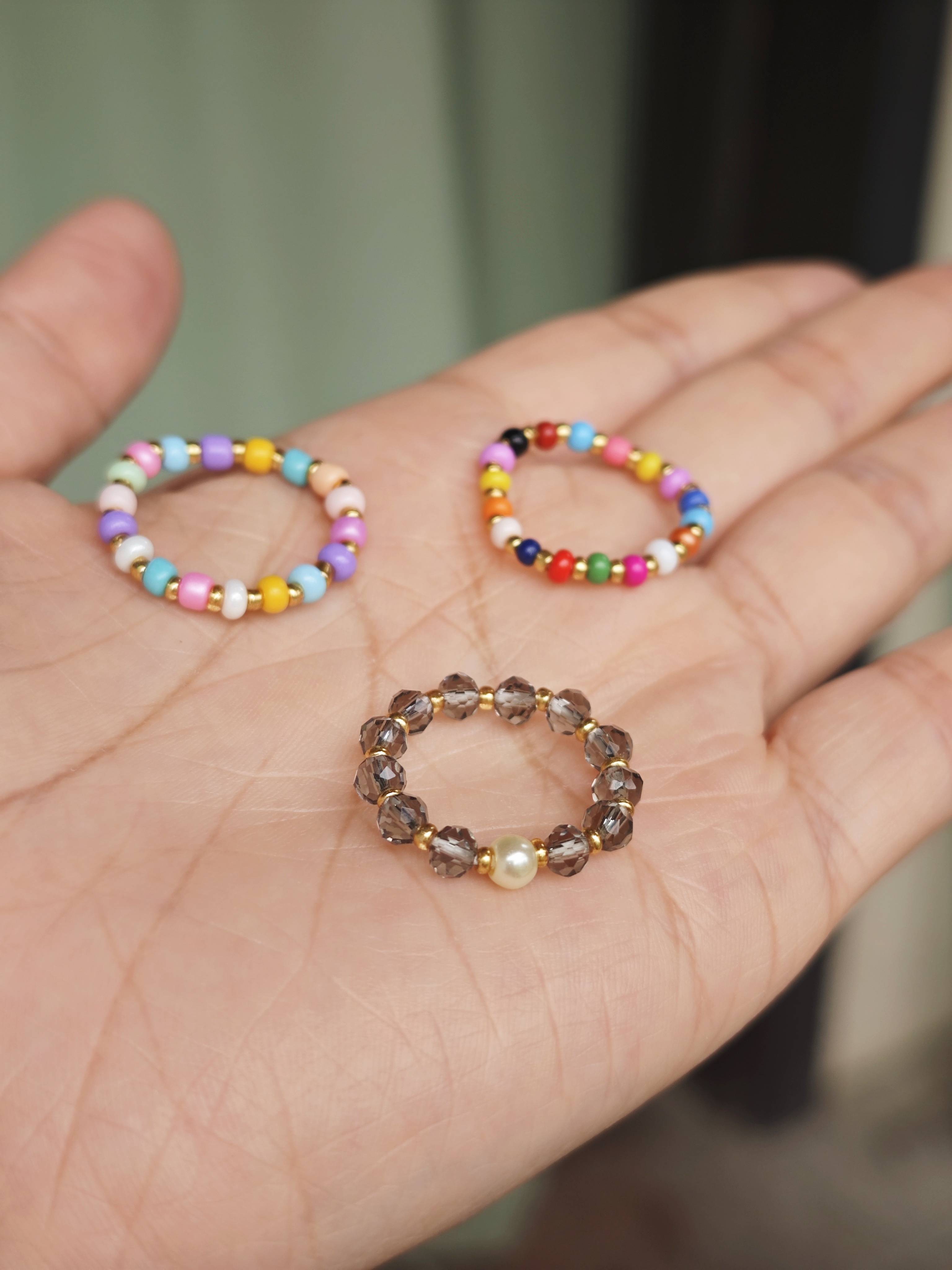 Exit European and American solitary colorful millet beads glass beads elastic ring