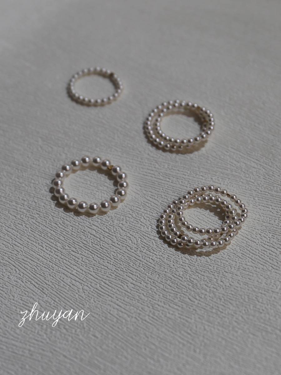 Niche Senior A sense of Shi Jiajia Pearl Ring Die vegetarian ring fingertips female light luxury tail rim pearl food finger ring