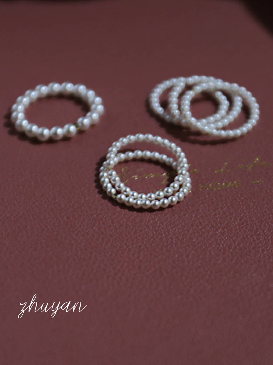Niche Senior A sense of Shi Jiajia Pearl Ring Die vegetarian ring fingertips female light luxury tail rim pearl food finger ring