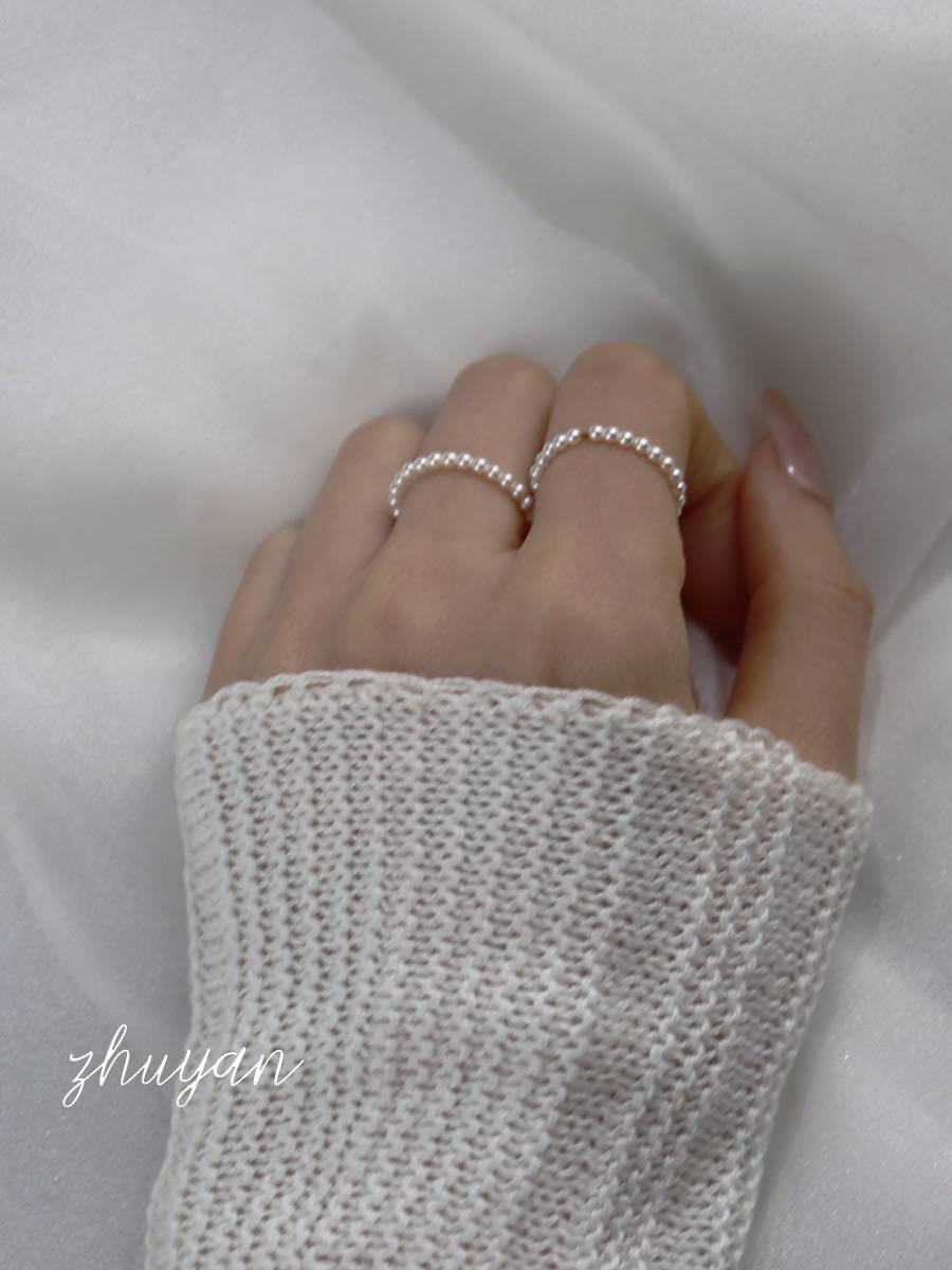 Niche Senior A sense of Shi Jiajia Pearl Ring Die vegetarian ring fingertips female light luxury tail rim pearl food finger ring
