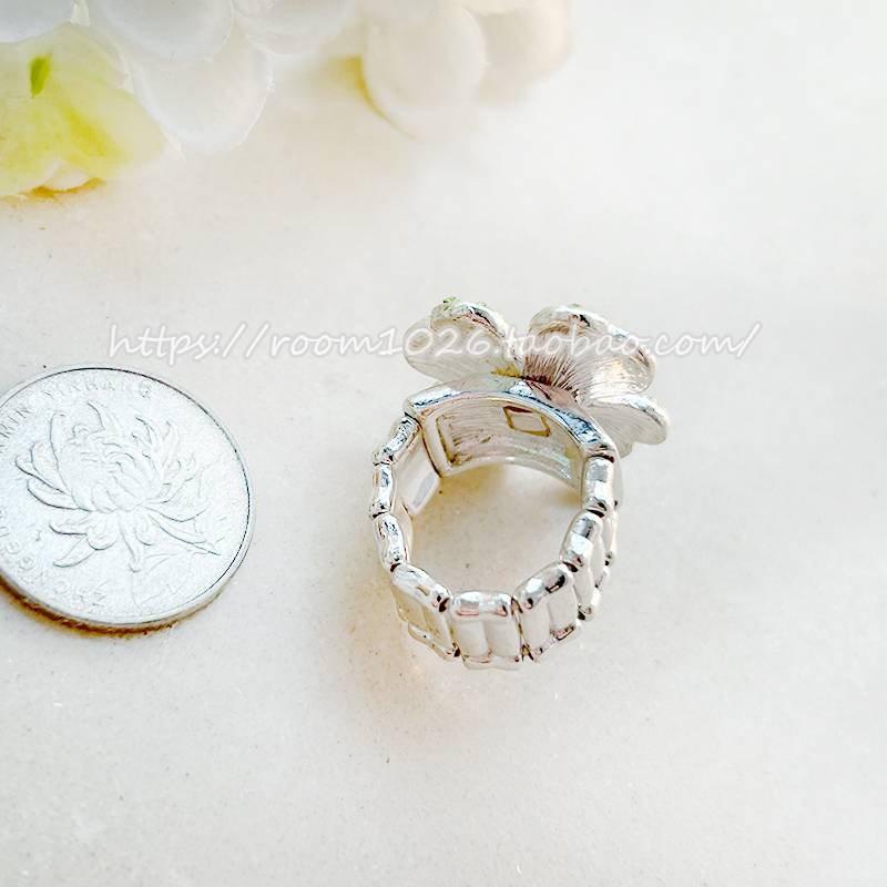 Original single European and American fan light green light yellow rhinestones filled with silver four -leaf grass shape elastic ring
