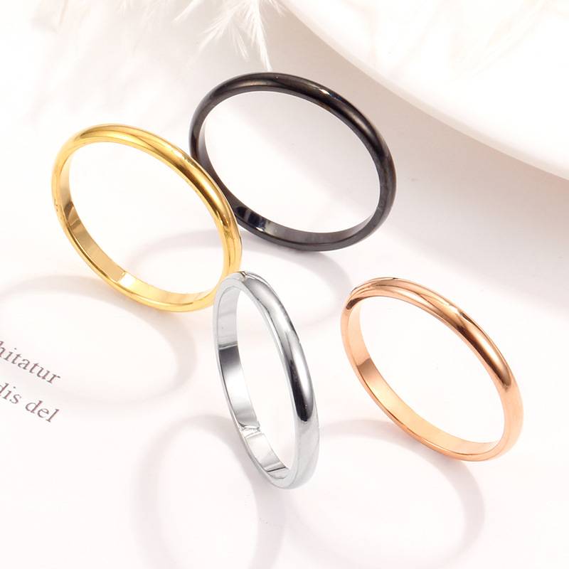 European and American new fashion minimalist optical noodle titanium steel ring plated 18K rose golden spherical stainless steel couple ring female