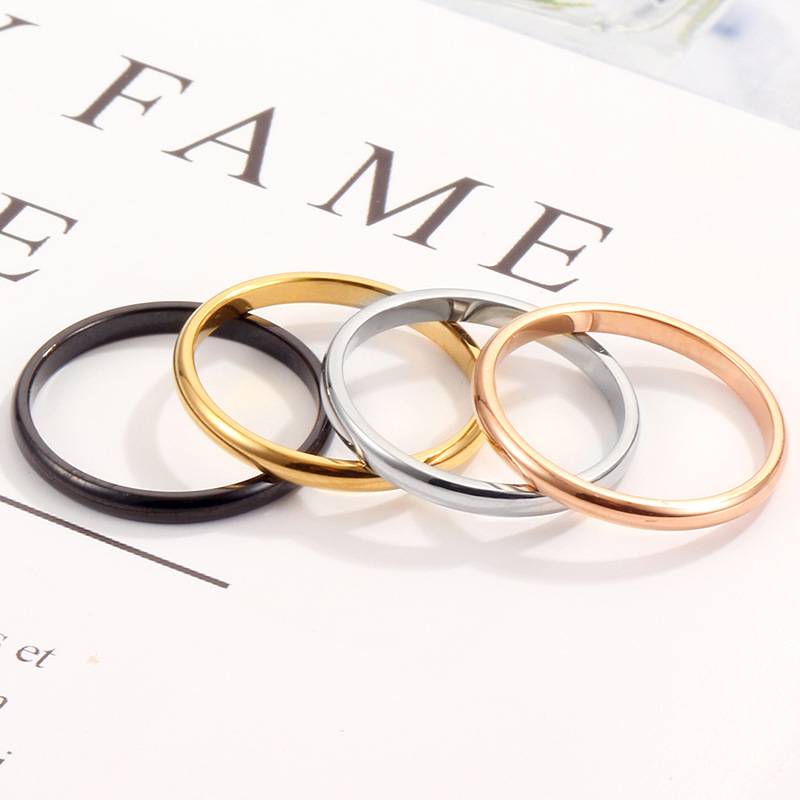 European and American new fashion minimalist optical noodle titanium steel ring plated 18K rose golden spherical stainless steel couple ring female