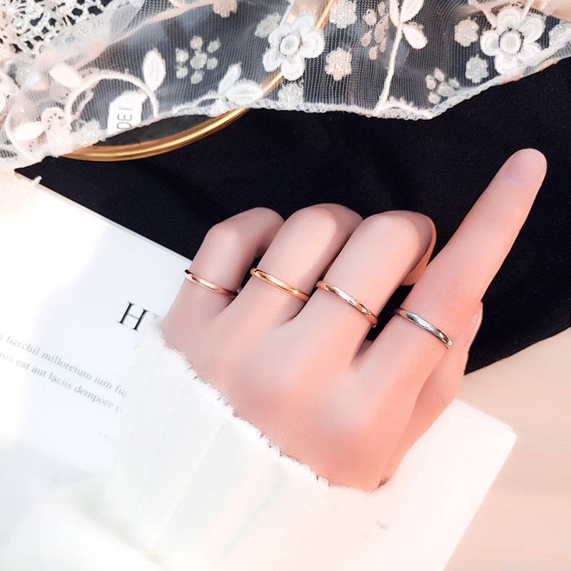 European and American new fashion minimalist optical noodle titanium steel ring plated 18K rose golden spherical stainless steel couple ring female