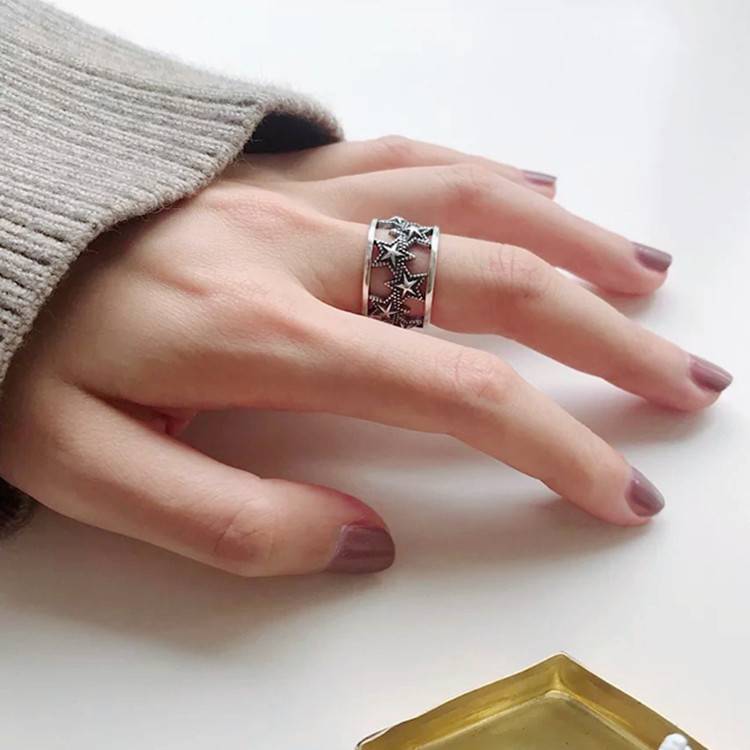 Student gift retro hollow star ring carved flowers, Sun Moon Star European and American Thai silver carved flowers
