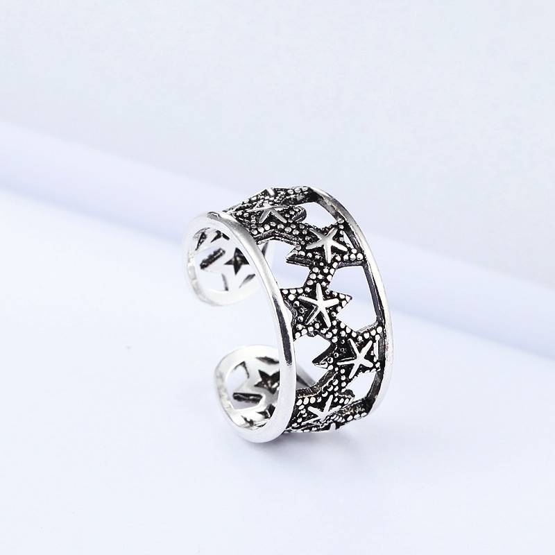 Student gift retro hollow star ring carved flowers, Sun Moon Star European and American Thai silver carved flowers