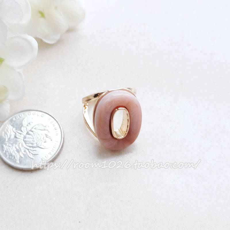 Original single European and American fan white dark pattern pink resin oval ring decorative gold ring