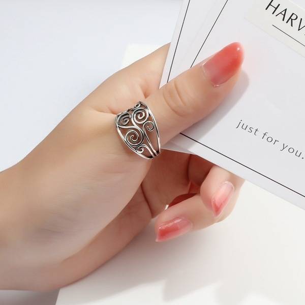 Zhenrong Wish hot selling new hollow flower ring European and American retro Thai silver black wedding ring female model
