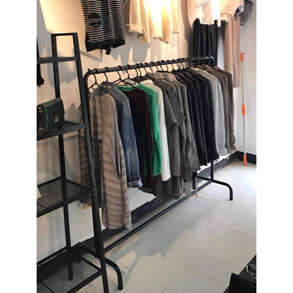 Family landing on the ground with a single -rod hanging rack bedroom in the drying rack room simple hanger simplicity drying clothes to store the shelf