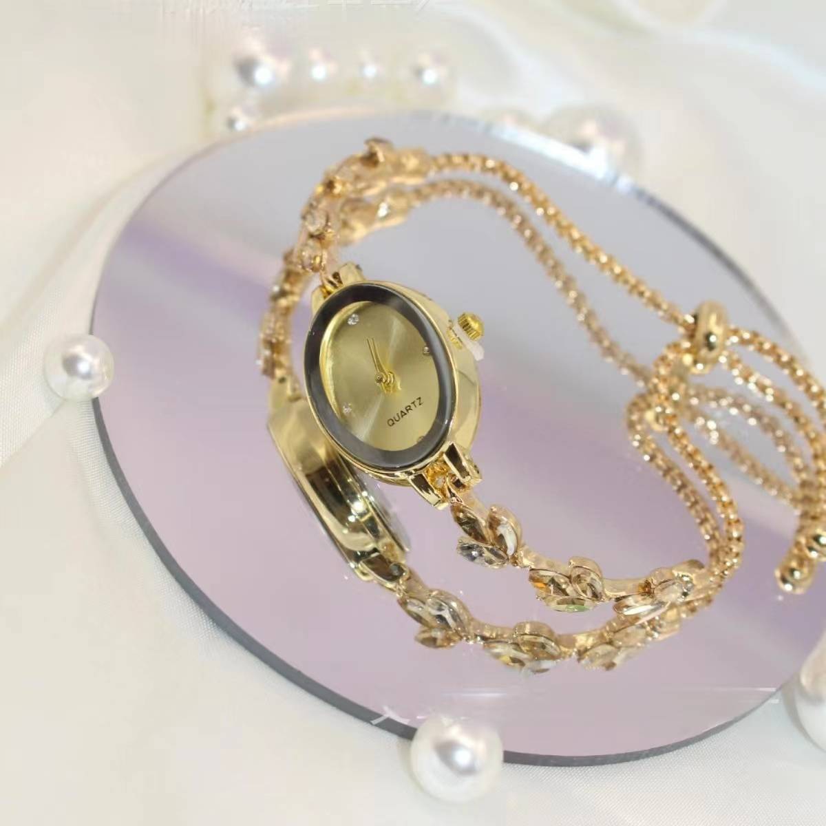 New hot -selling medium -old fashion niche ladies watch light luxury free adjustment bracelet quartz watch manufacturer direct sales
