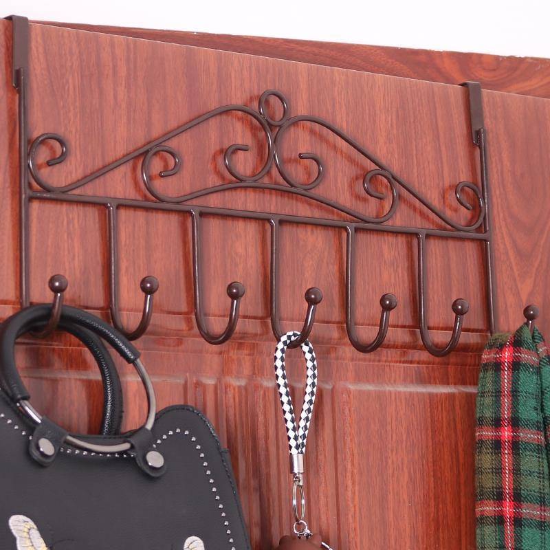 Behind the door behind the door, the bedroom hangs on the door on the door of the door hook the hanger without a trace coat hook to the hand to do freely