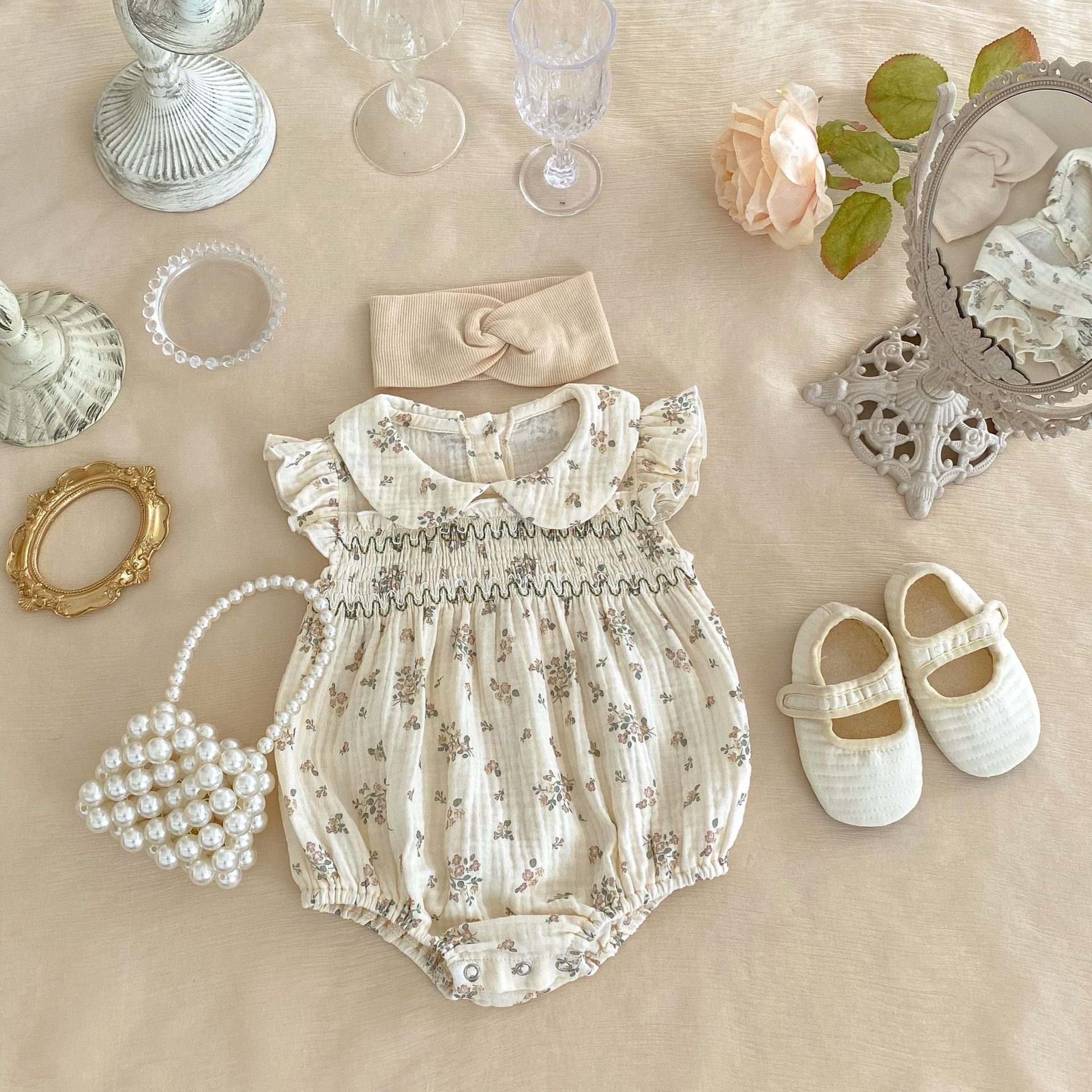 Hot Sale Doll Collar Baby Girl 100% Muslin Cotton Baby Clothes Summer Sleeveless Ruffled Floral Jumpsuit Baby Romper