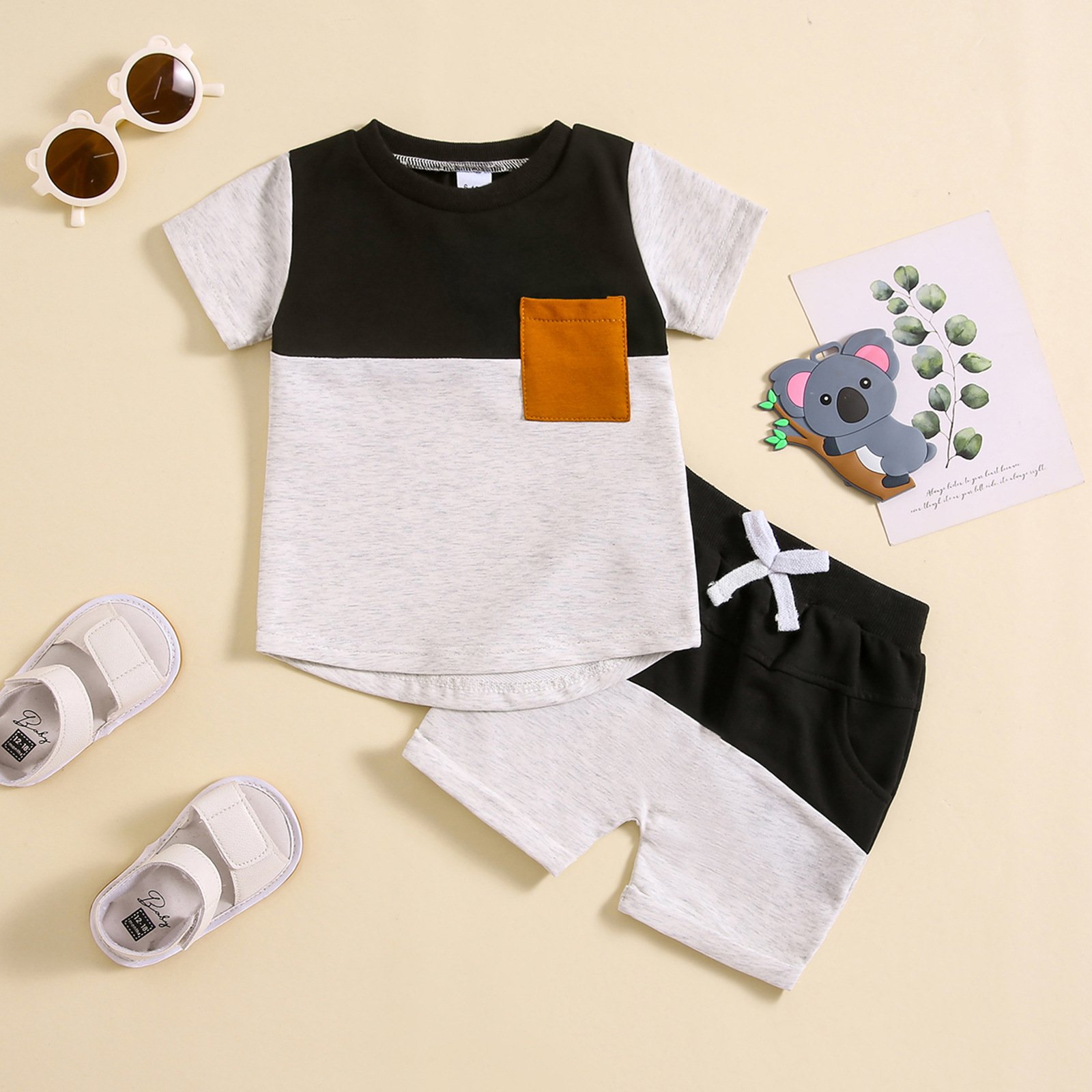 Boys and girls' summer new color blocked round neck short sleeved shorts set with multiple colors
