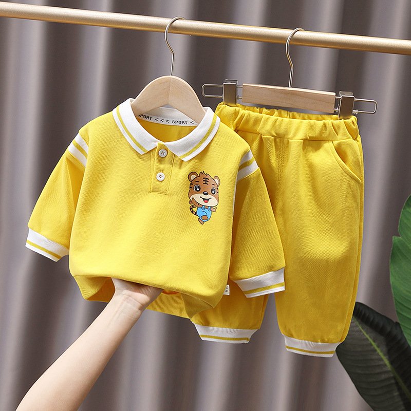 Manufacturers wholesale ultra low price autumn solid color Polo long-sleeved shirt and pants two children's clothing sets