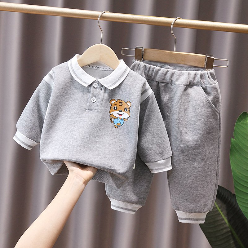 Manufacturers wholesale ultra low price autumn solid color Polo long-sleeved shirt and pants two children's clothing sets