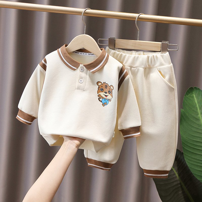 Manufacturers wholesale ultra low price autumn solid color Polo long-sleeved shirt and pants two children's clothing sets