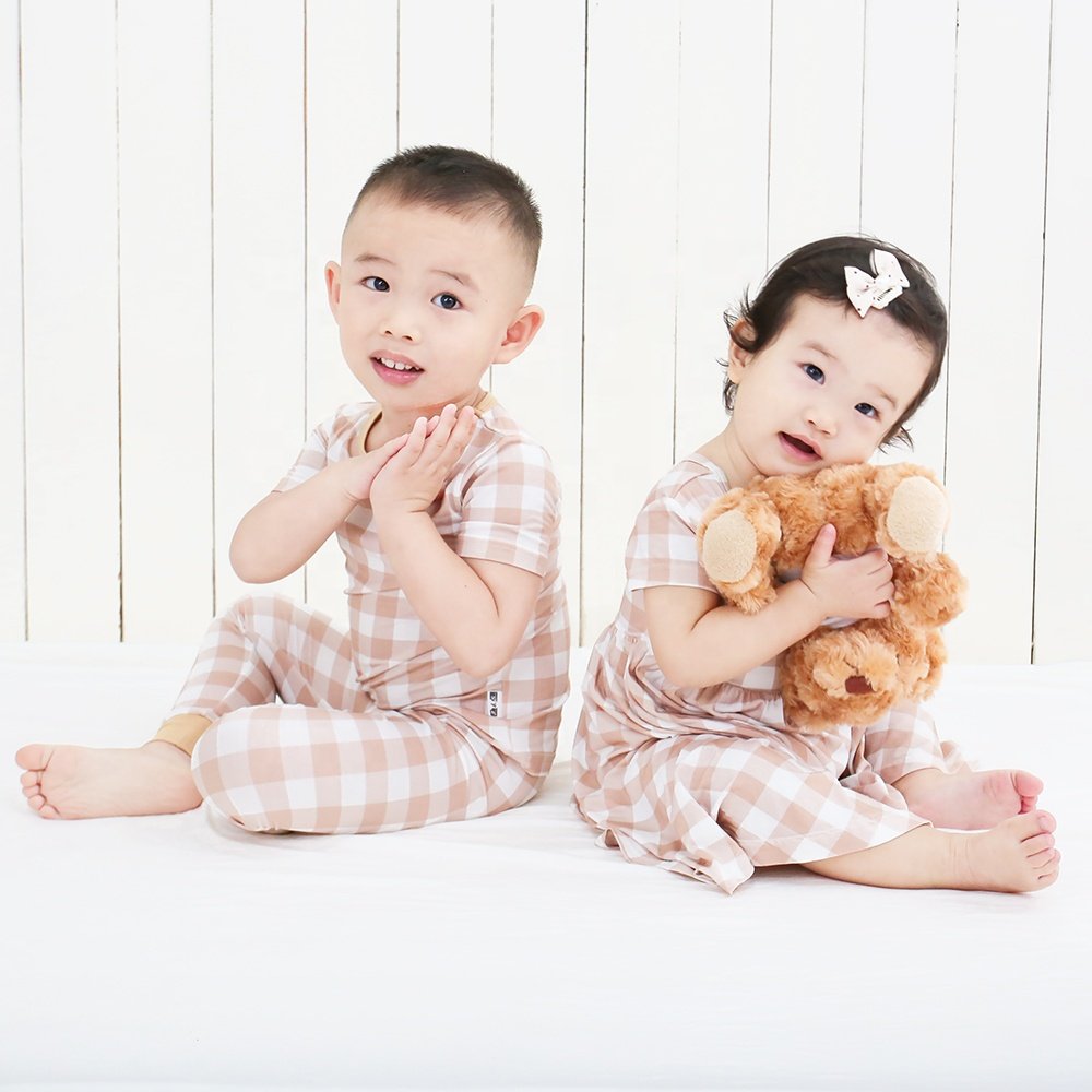 Hot sale Casual New Design Baby Pyjamas Solid Colour Short Shirt and Long Pants comfortable for Spring Featuring Cartoon Pattern